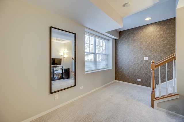 3460 Bradbury Cir, Aurora, IL 60504 - spare room with carpet, stairway, baseboards, wallpapered walls, and a smoke detector