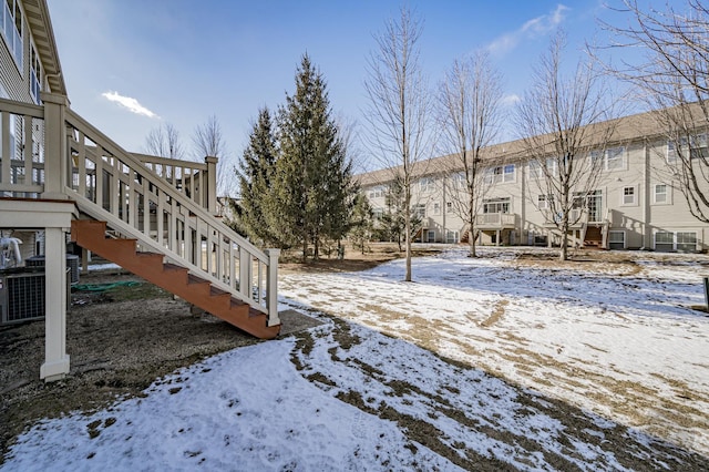 3460 Bradbury Cir, Aurora, IL 60504 - yard covered in snow featuring stairs and central AC
