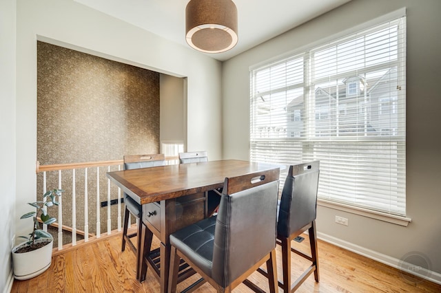 3460 Bradbury Cir, Aurora, IL 60504 - dining area with light wood-style floors and baseboards