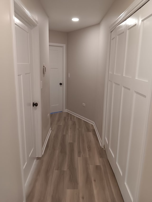 hallway featuring hardwood / wood-style floors