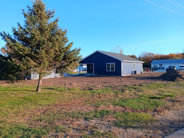 exterior space featuring central AC unit