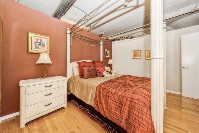 bedroom featuring light hardwood / wood-style floors