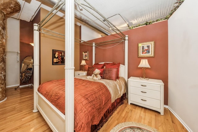 bedroom featuring light wood-type flooring