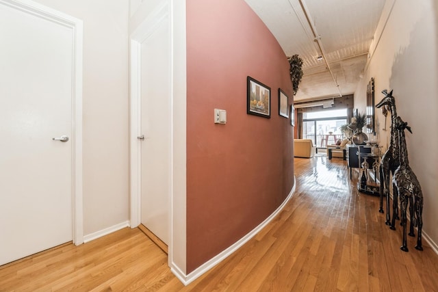 hallway featuring light hardwood / wood-style flooring