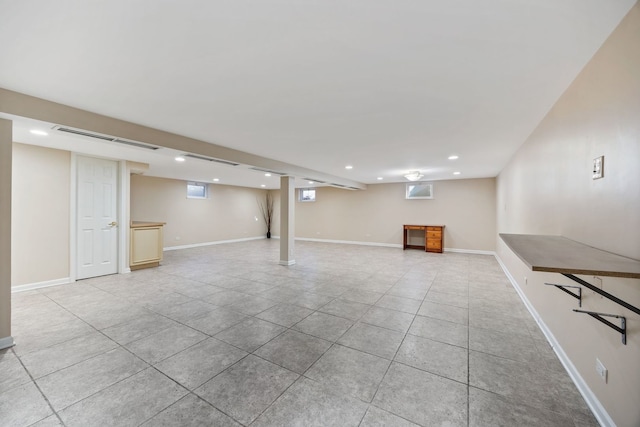 basement with light tile patterned flooring