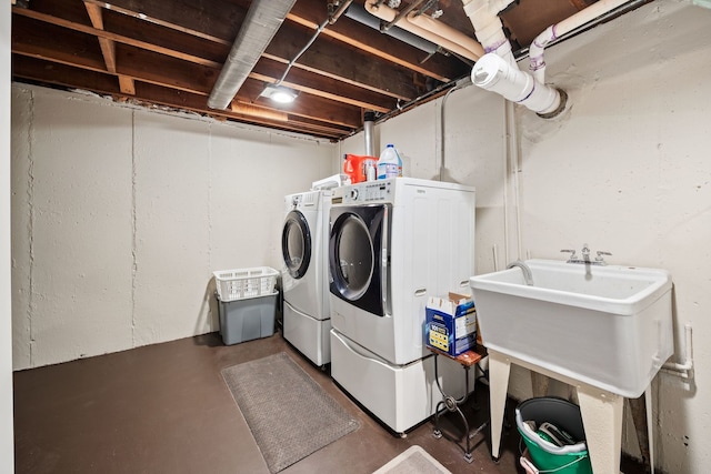 laundry room with separate washer and dryer