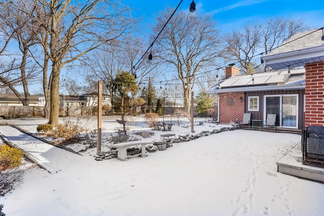 view of yard covered in snow