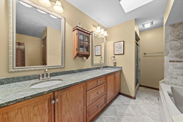 bathroom with separate shower and tub, vanity, and a skylight