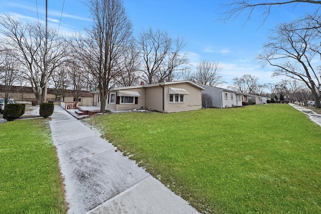 view of front of property with a front yard