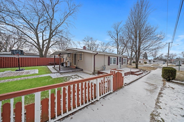 view of property exterior featuring a lawn