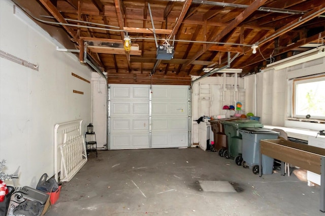 garage featuring a garage door opener