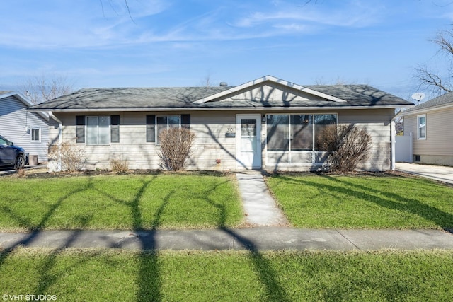 ranch-style house with a front yard