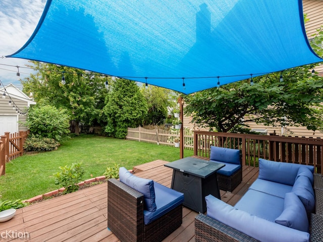 wooden deck featuring an outdoor hangout area and a lawn