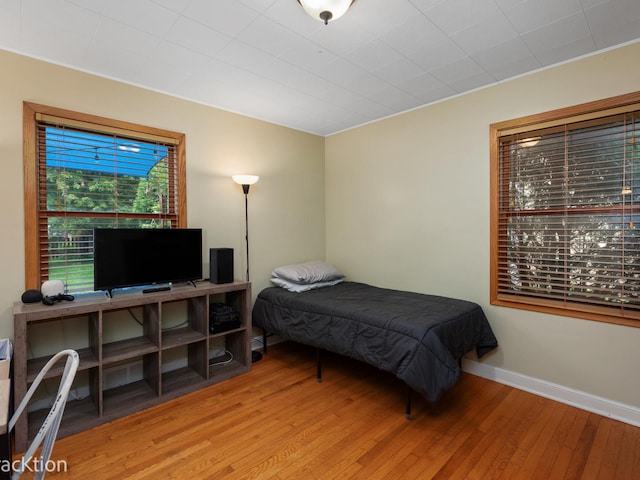 bedroom featuring light hardwood / wood-style floors