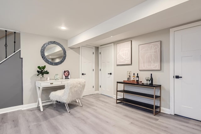 office space with light hardwood / wood-style floors