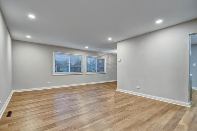 unfurnished room featuring light wood-type flooring