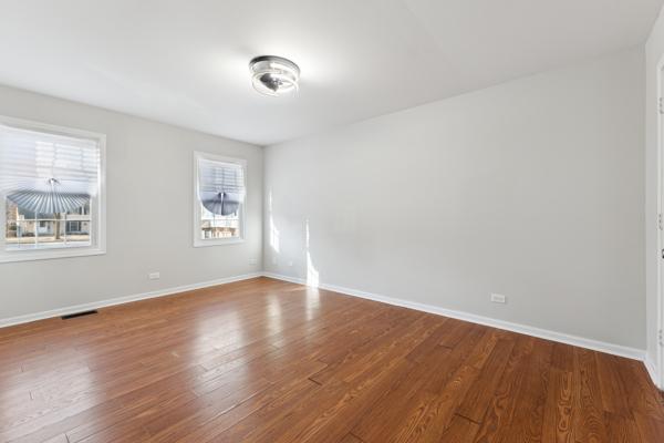 empty room featuring wood-type flooring