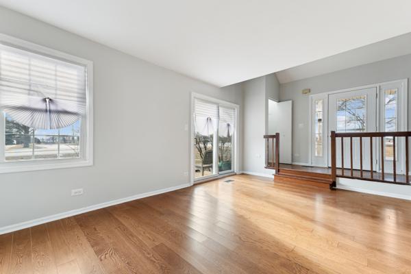 spare room featuring hardwood / wood-style floors