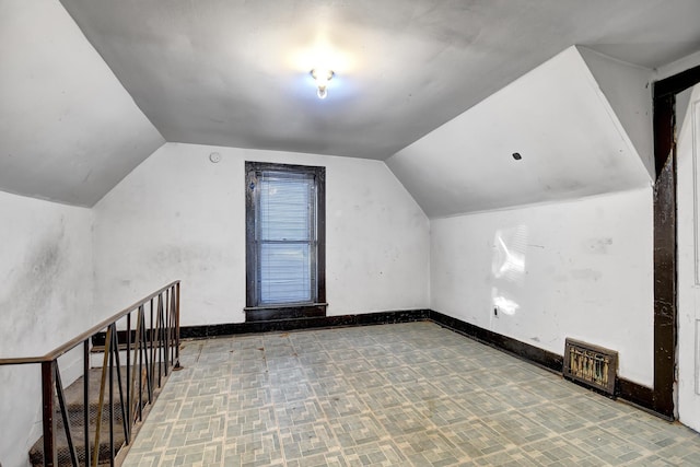 bonus room with lofted ceiling