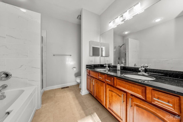 full bathroom featuring vanity, toilet, separate shower and tub, and tile patterned flooring