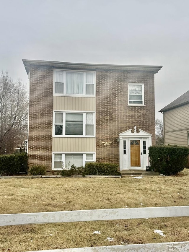 view of front of property with a front lawn