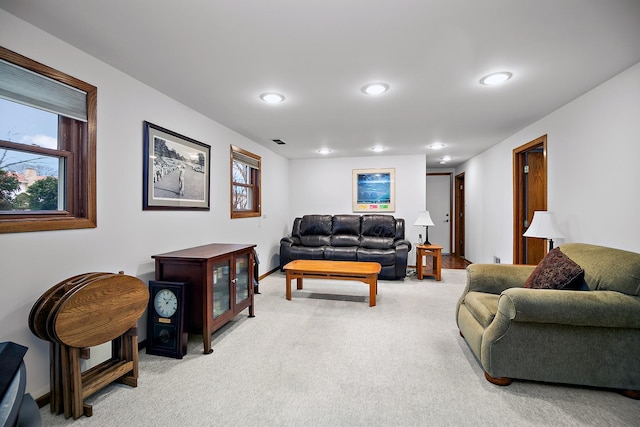 living room with light colored carpet