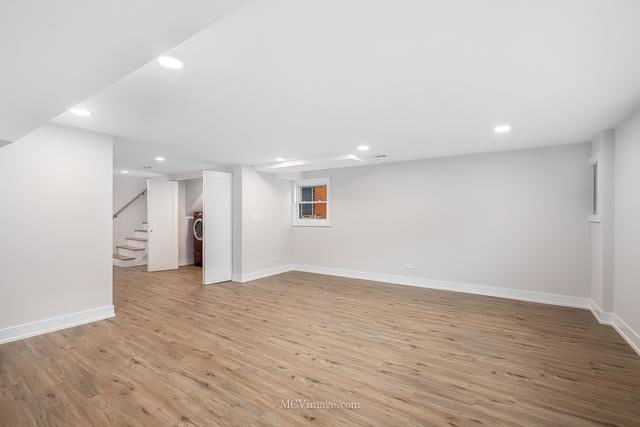 basement featuring light wood-type flooring