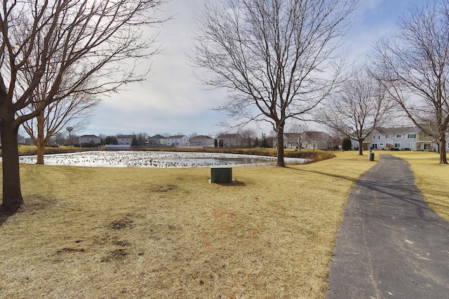 view of yard with a water view