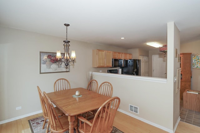 dining area featuring light hardwood / wood-style flooring