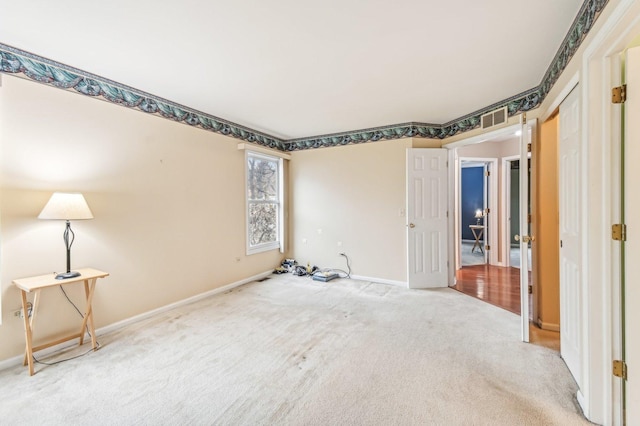 unfurnished bedroom featuring carpet floors