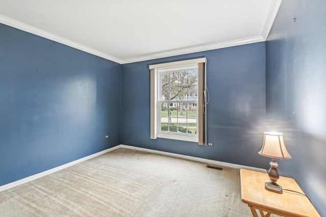 carpeted empty room with ornamental molding