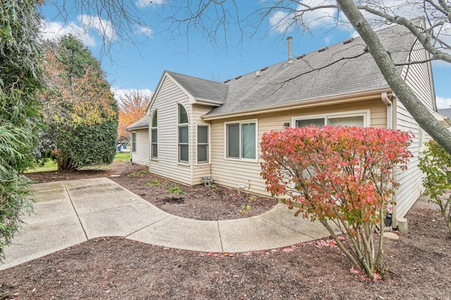 view of property exterior featuring a patio