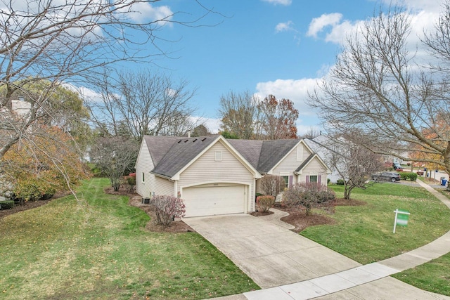 view of front facade with a garage and a front yard