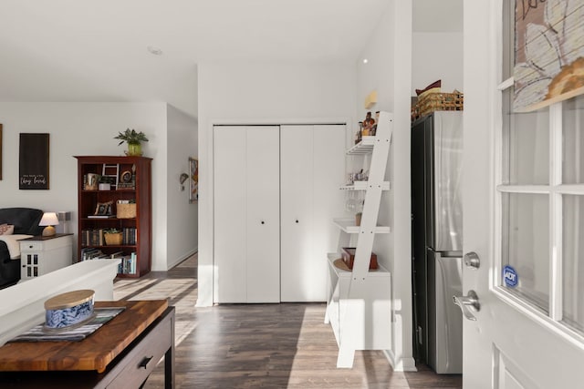 interior space with dark hardwood / wood-style floors