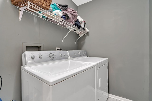 laundry room featuring independent washer and dryer