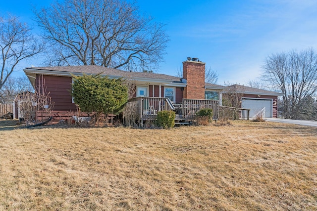 single story home with a garage and a front yard