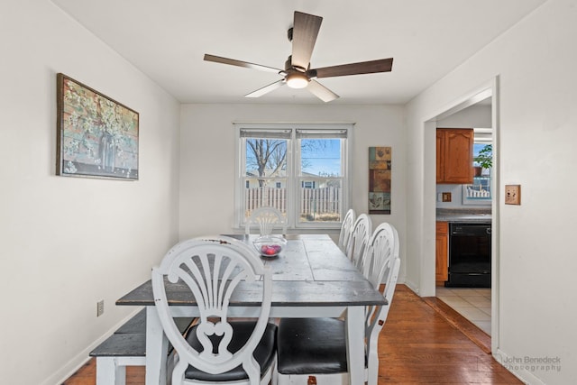 dining area featuring hardwood / wood-style floors and ceiling fan