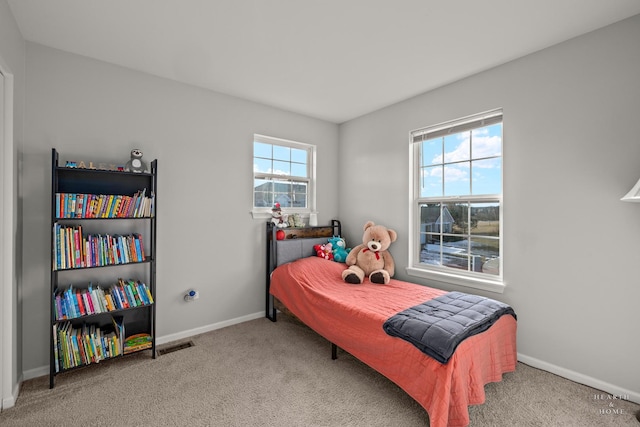 bedroom featuring carpet flooring