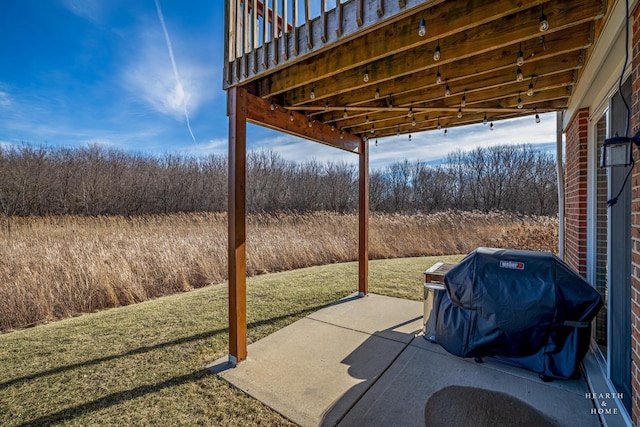 view of patio with a grill