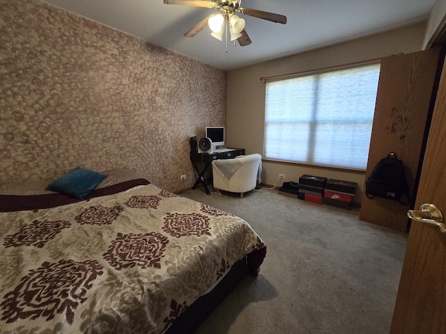 carpeted bedroom featuring ceiling fan