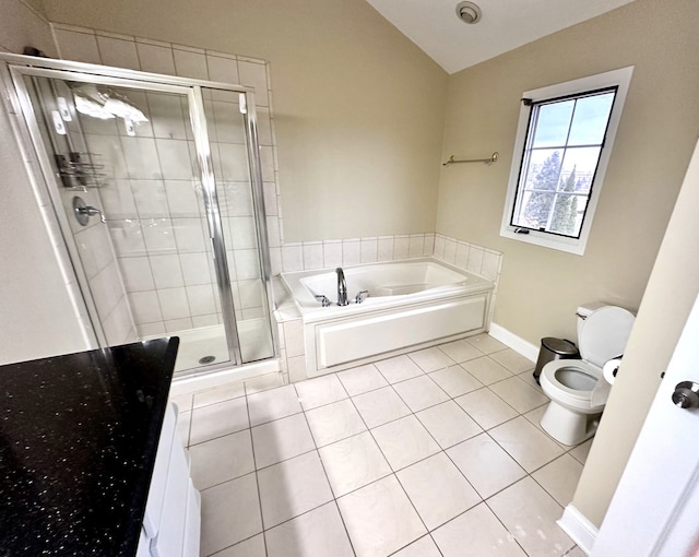 bathroom with tile patterned flooring, vaulted ceiling, independent shower and bath, and toilet