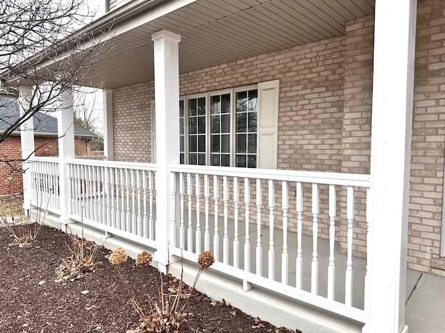 view of property exterior with a porch