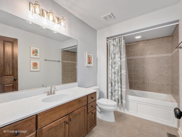 full bathroom with vanity, tile patterned floors, shower / bath combination with curtain, and toilet