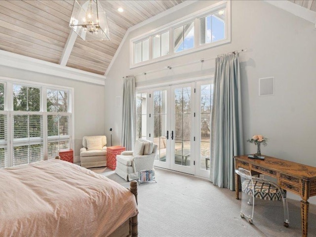 carpeted bedroom with wood ceiling, access to outside, multiple windows, and french doors