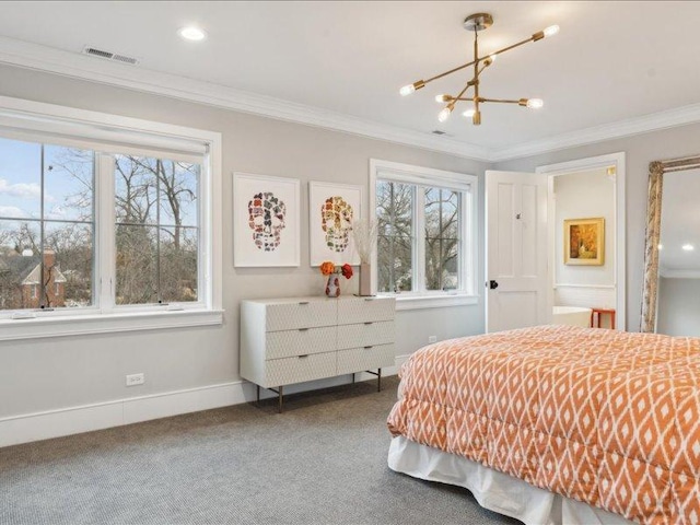 bedroom with carpet flooring, visible vents, baseboards, ornamental molding, and an inviting chandelier