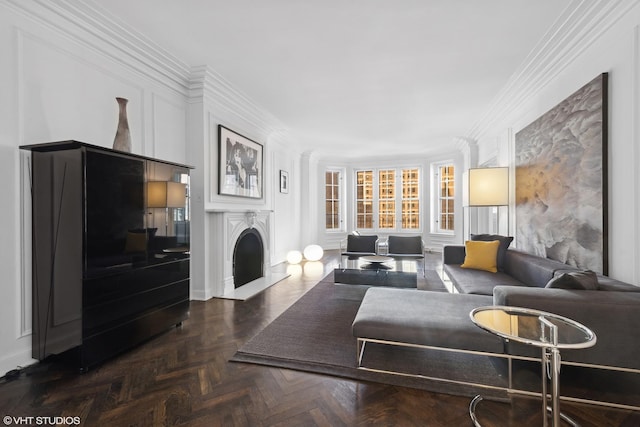 living room featuring crown molding and parquet flooring