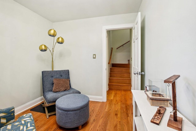 living area with light hardwood / wood-style floors