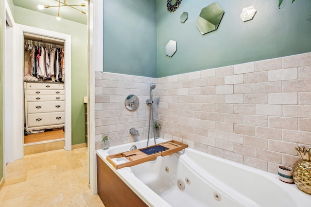 bathroom featuring a tub to relax in