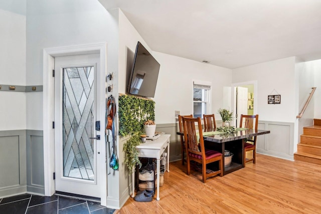 dining room with hardwood / wood-style floors