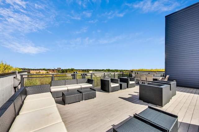 wooden deck with an outdoor hangout area